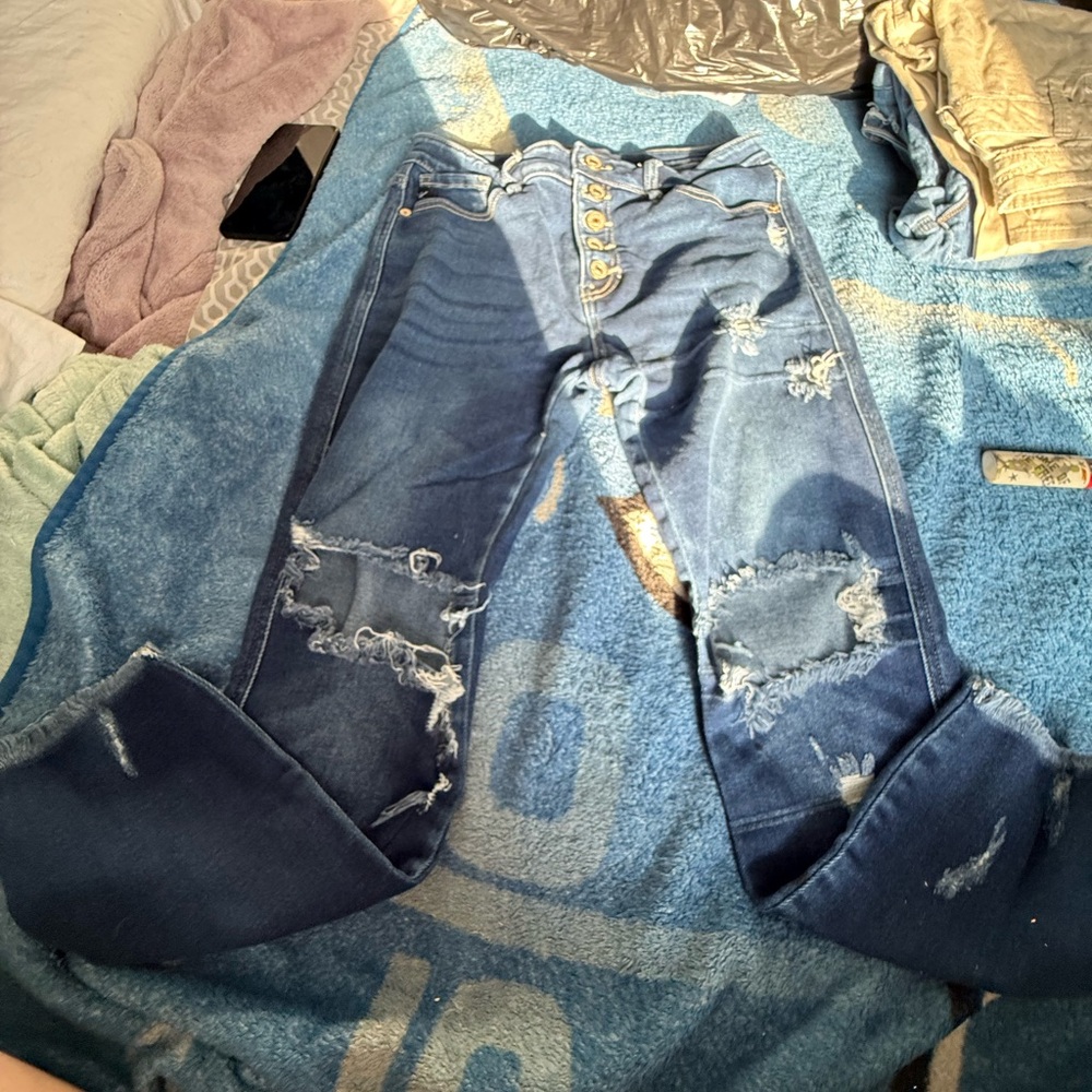 Distressed Blue Jeans